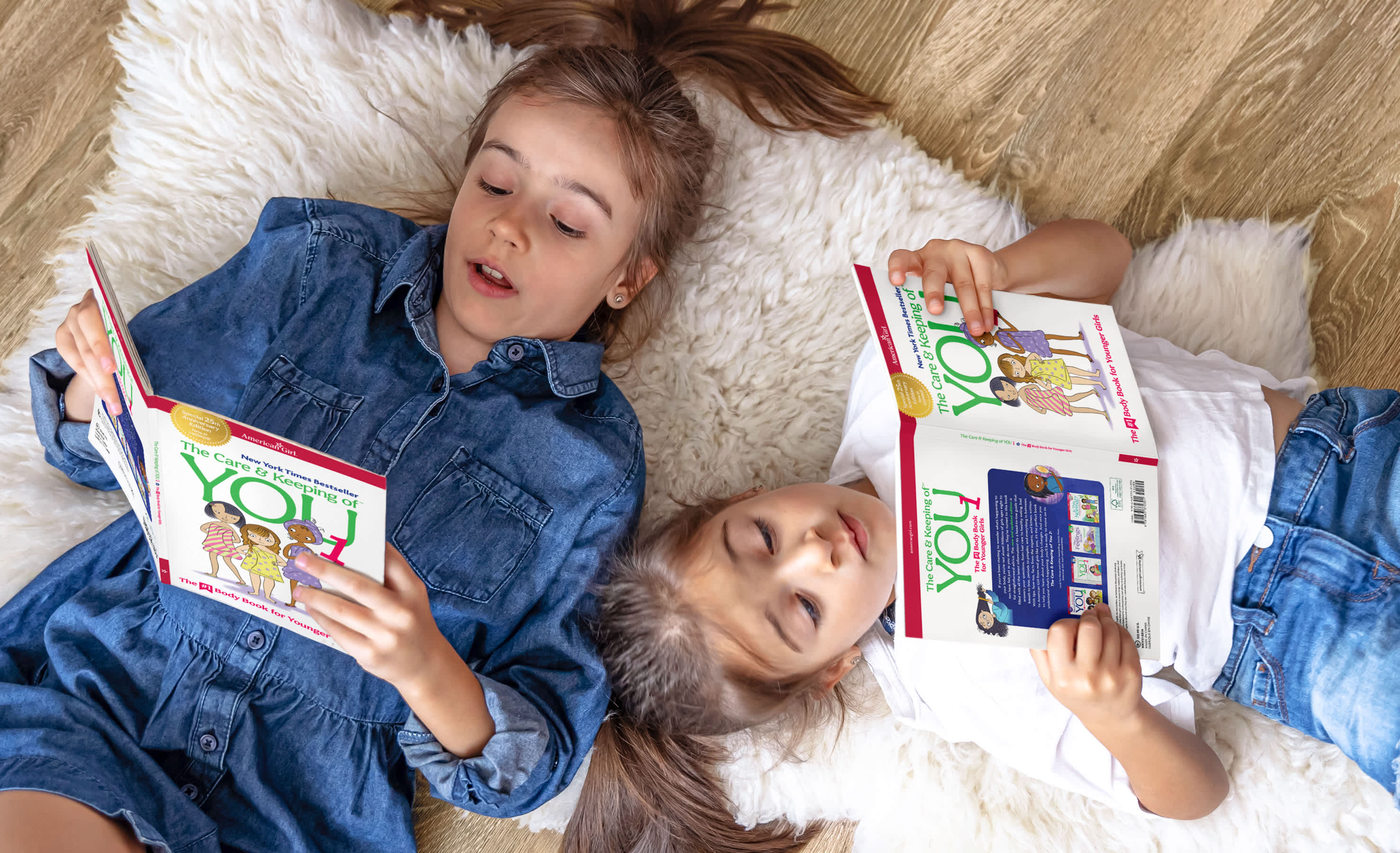 Girls laying down while reading The Care & Keeping of You